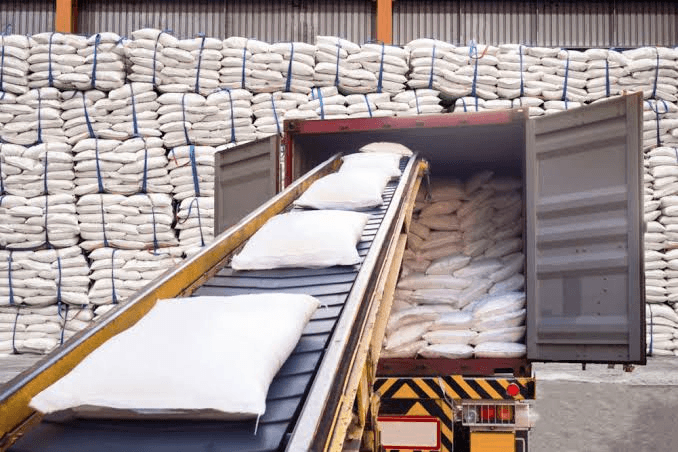 Loading sugar bags into export shipping container